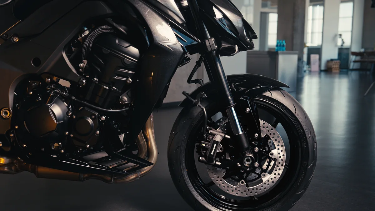 Close detail of a Kawasaki motorcycle