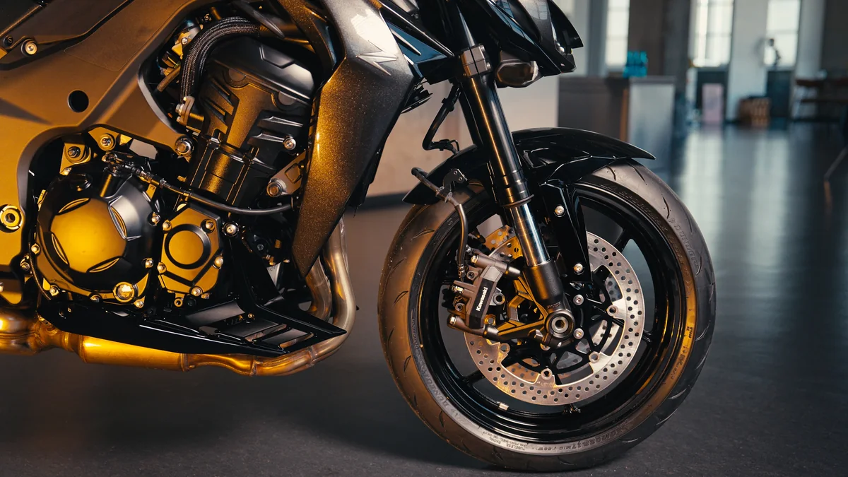 Cinematic detail of a Kawasaki motorcycle