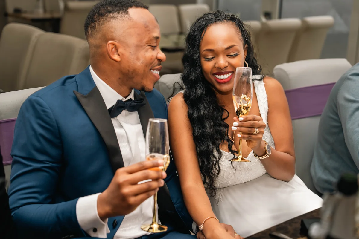 Wedding couple sharing a toast
