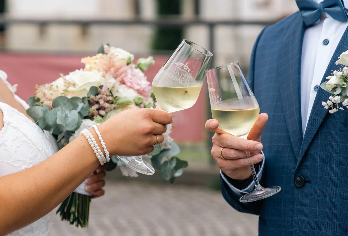 Close moment as a wedding couple shares a toast
